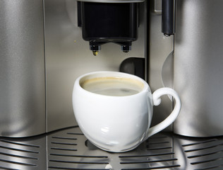 Modern Coffee Machine and a cup