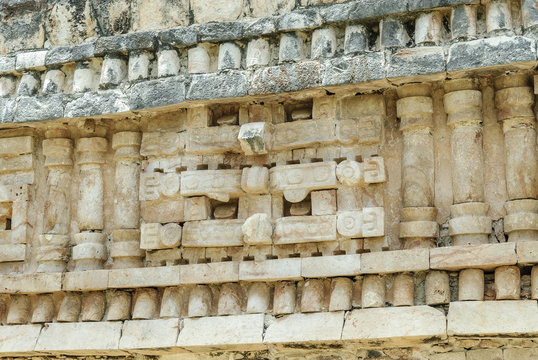 relief with the mask of the Mayan god Chaac in a building of the palace in ruins of the archaeological enclosure of Labna in Yucatan, Mexico.