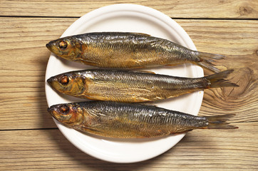 Smoked herring in plate