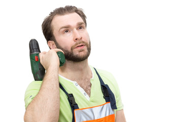 Naklejka premium man in overalls with a hammer