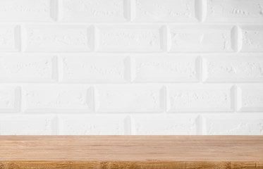 White brick loft background with a wooden table