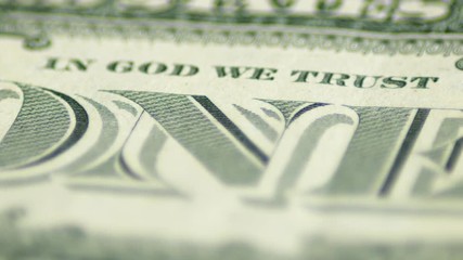 Slow Rotating One Dollar Bill Macro Boken In God We Trust