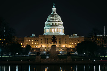 The United States Capitol at night, in Washington, DC.