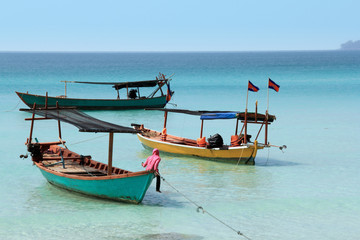 Cambodian boats with flags