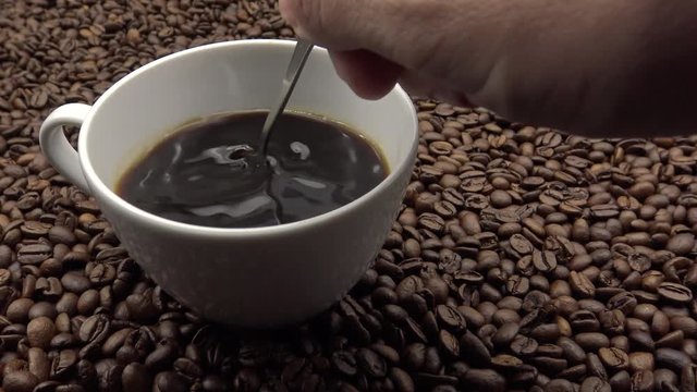 4k Mixing Shugar In The Cup Of Coffe-Dan