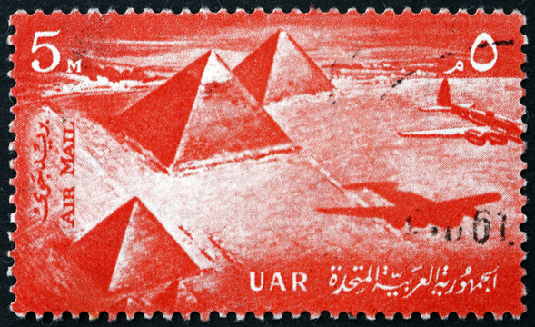 Postage stamp Egypt 1959 Airplane over Giza pyramids