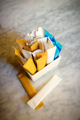 White sugar sachets and Creamer