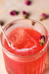 Red cocktail in old fashioned glass, selective focus