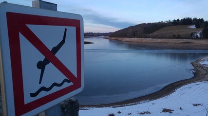 No diving sign & river