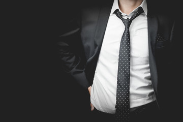 man in suit on a black background