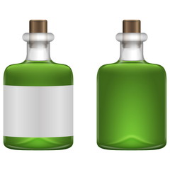 Green beverage in glass bottle