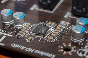 Fototapeta na wymiar motherboard repair, chip, closeup, dust, service