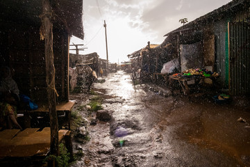 African open air market while raining