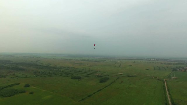 Paraplane in the air aerial shot 4k