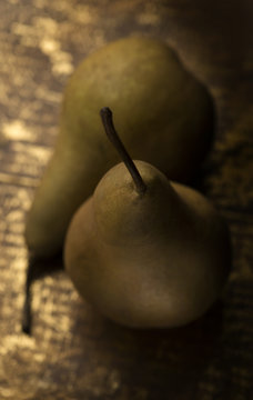 Pears on golden colour background