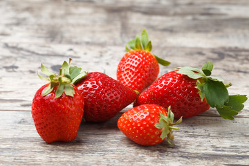 Fresh strawberries on a wooden table