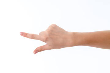 female hand pointing in the direction of isolated on white background - obrazy, fototapety, plakaty