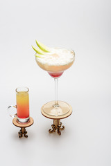 cocktails: sex on the beach and margarita on decorative tables