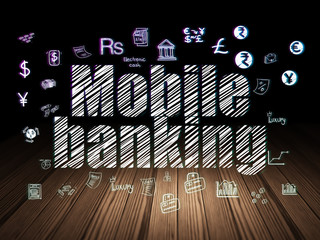 Fototapeta na wymiar Currency concept: Mobile Banking in grunge dark room