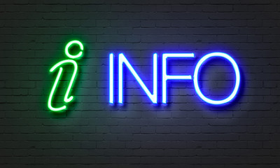 Info neon sign on brick wall background.