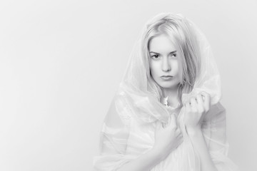 portrait of a blonde in white dress