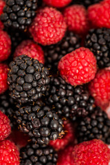 blueberries, raspberries and black berries shot top down