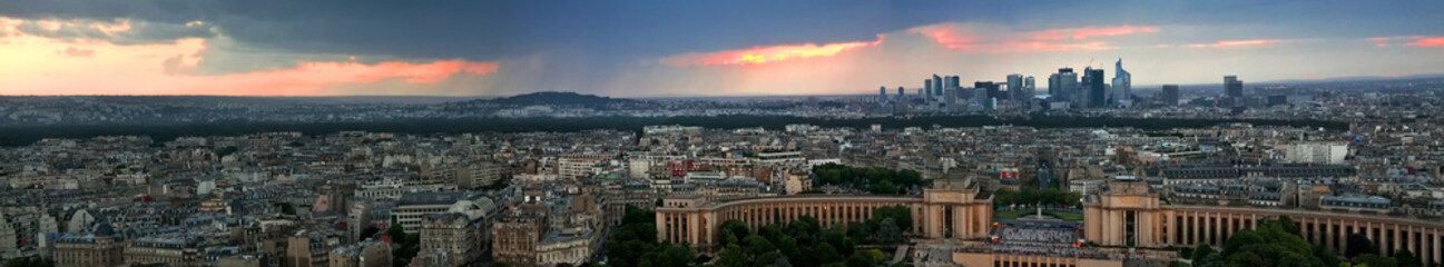 Fototapeta na wymiar Evening panorama of Paris at sunset from a high tower
