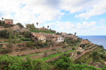 Fototapeta na wymiar Town Banyalbufar mountain panorama and Mediterranean Sea on Majorca, Spain