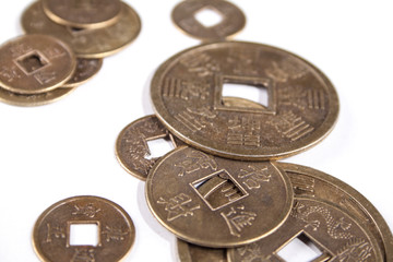 Chinese coins for luck isolated on white background