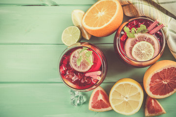 Sangria and ingredients in glasses