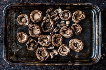 Baked Mushrooms in glass bowl. (scary food)