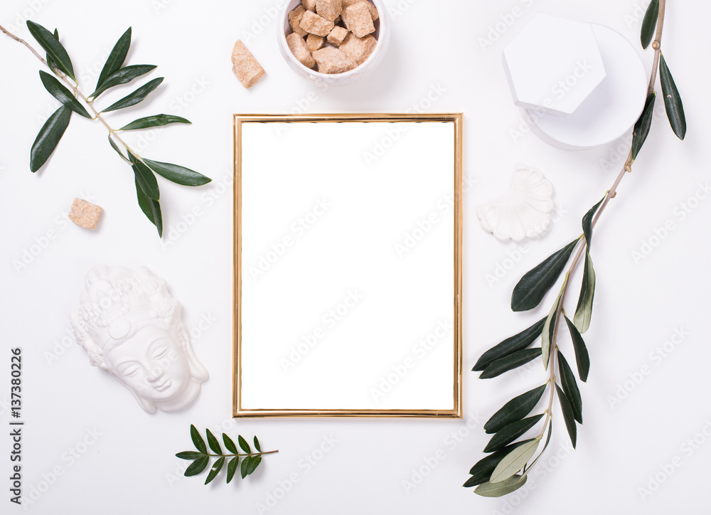 Wall mural golden frame mock-up on white tabletop