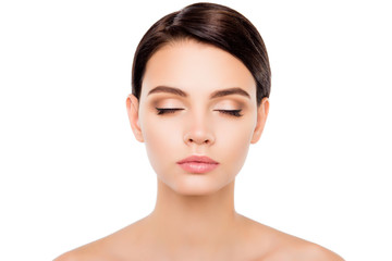 Beautiful girl with closed eyes showing her maquillage