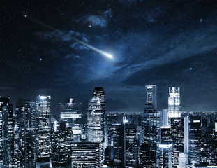 Naklejka premium shooting star in the Singapore night sky