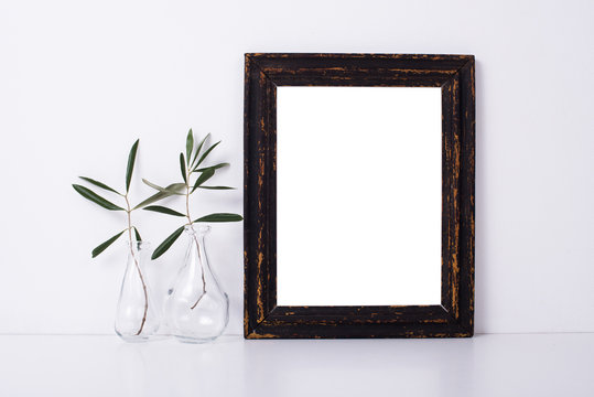 Wooden frame and flowers, home decoration mock-up 