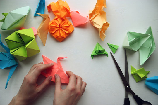 Multicolored Origami on a white table