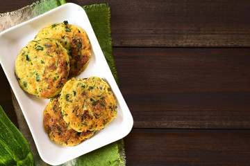 Zucchini, couscous and parsley fritters, photographed overhead with natural light (Selective Focus,...