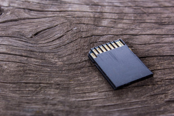 sd card on the wooden desk