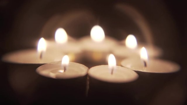 This shot of tea candles is part of a large collection of varying elements available in 4k or 1080p. If you’re looking for a unique look or more options, please check out my channel for more.