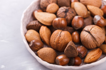 Mixed nuts.Walnuts,Brazil nuts,almonds,hazelnuts.Concept of Healthy Eating.selective focus.