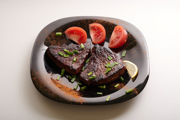 fried steak on a white background