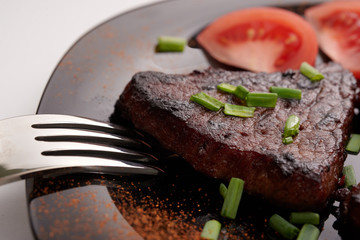 fried steak on a white background