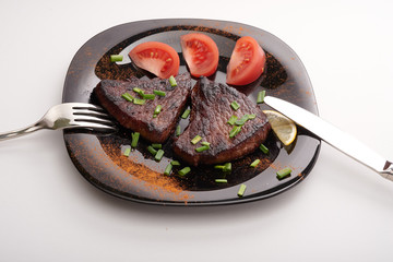 fried steak on a white background