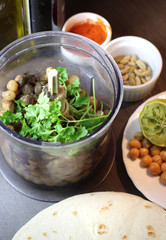 Hummus preparation with parsley and chickpeas