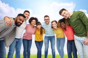 international group of happy people hugging