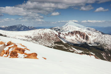 Fototapeta na wymiar Spring mountain landscape. Snowy Mountains