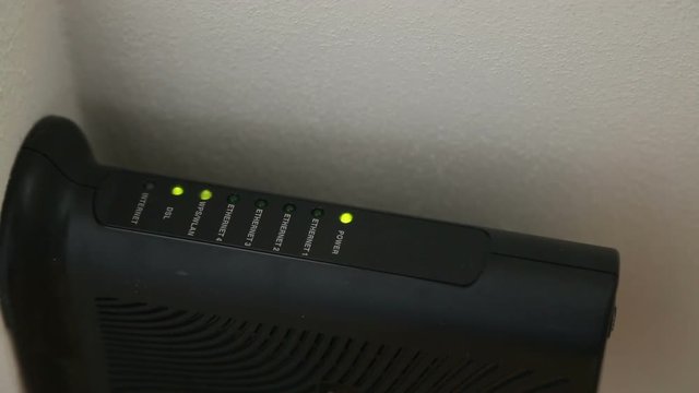 Closeup of the status LEDs on a broadband modem