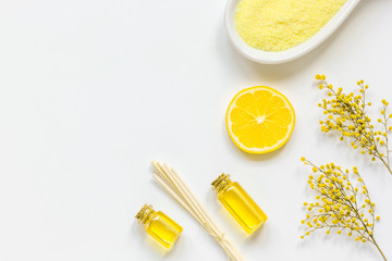 Natural cosmetic seasalt and oil on white background top view mock up