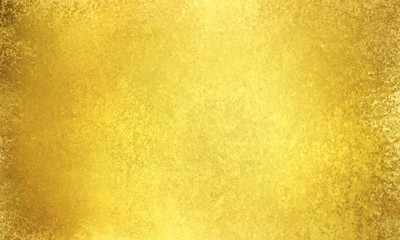 gold background paper with vintage texture and shiny gold surface, elegant yellow and golden brown hues, solid gold backdrop