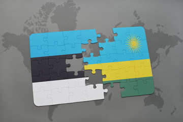 puzzle with the national flag of estonia and rwanda on a world map